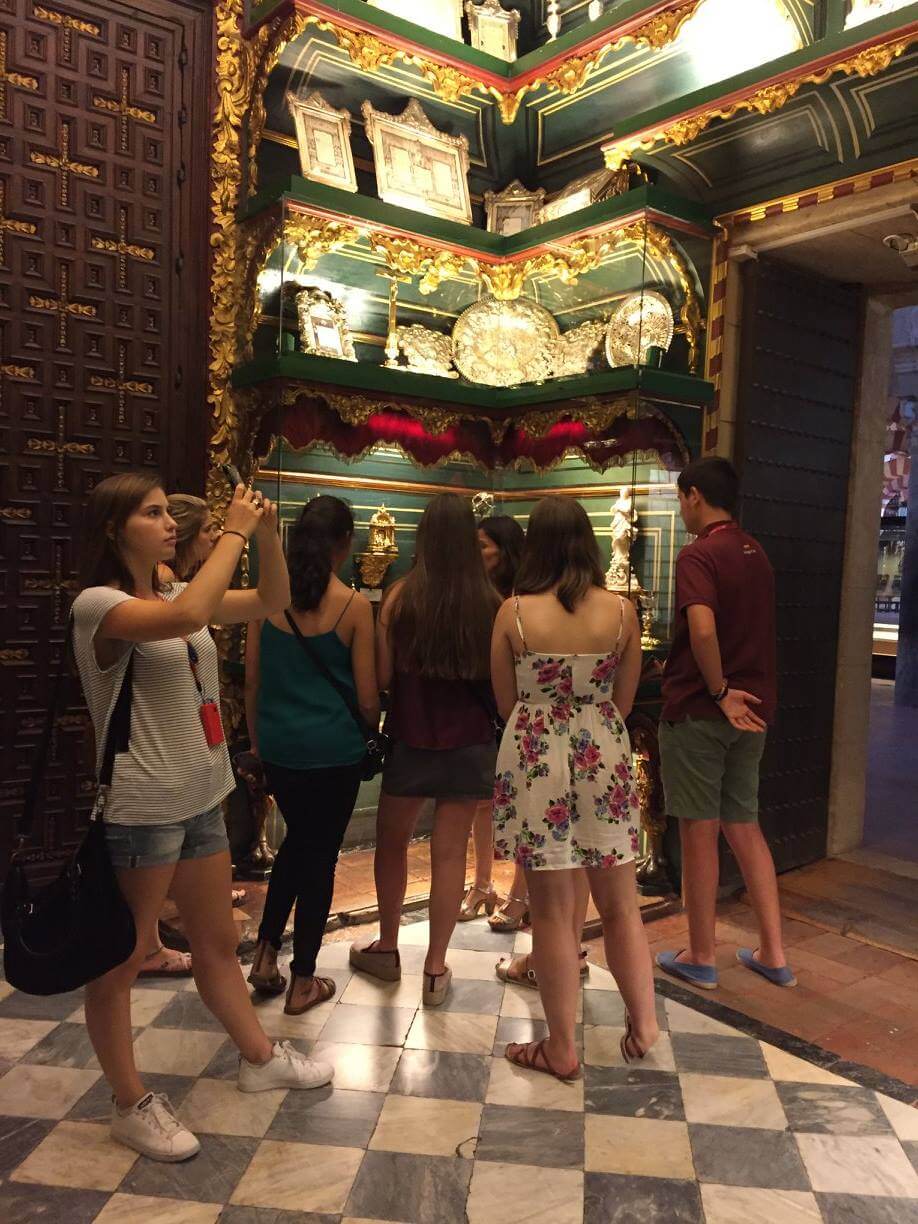 Students set sail on a historical voyage at Seville's Torre del Oro Naval Museum, exploring Spain's maritime past.